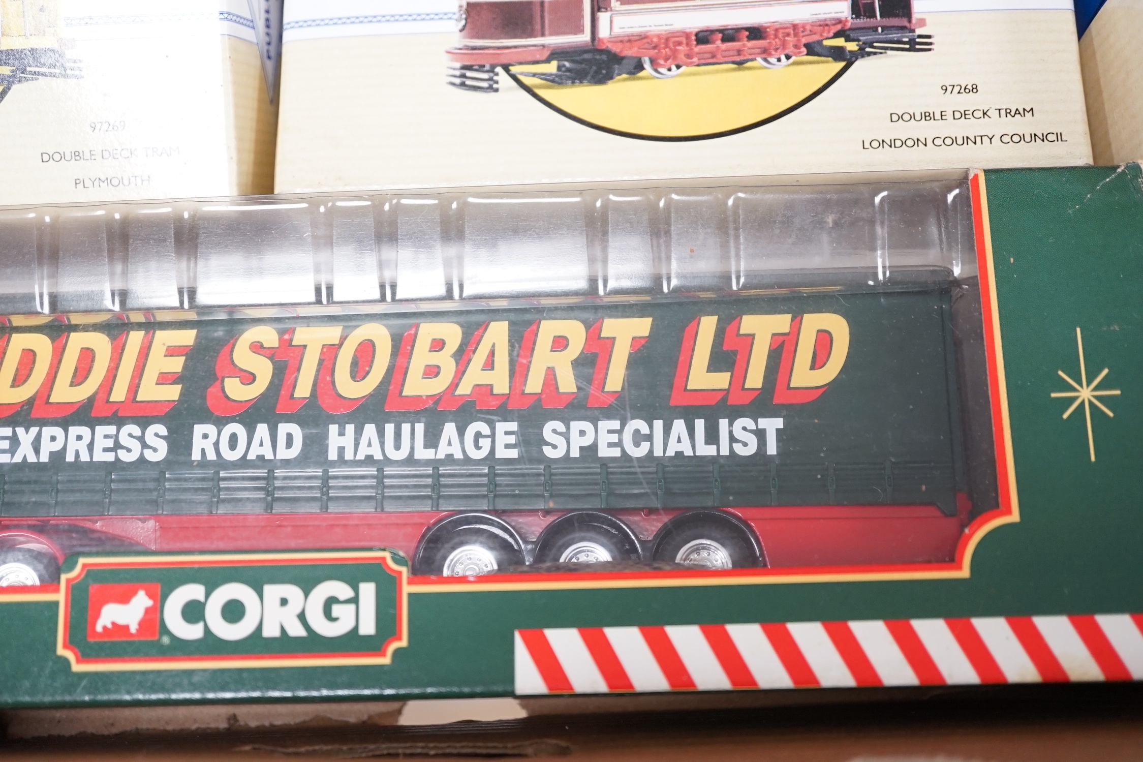 Eight boxed Corgi toys and two other die-cast models including; Eddie Stobart commercial vehicles, two Guy Arab buses, two double deck trams, etc.